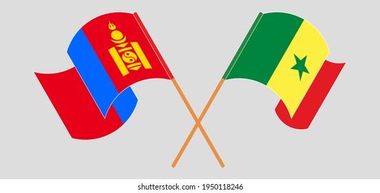 Crossed and waving flags of Mongolia and Senegal
