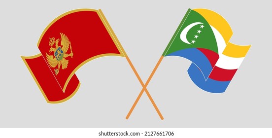 Crossed and waving flags of Montenegro and Comoros. Vector illustration
