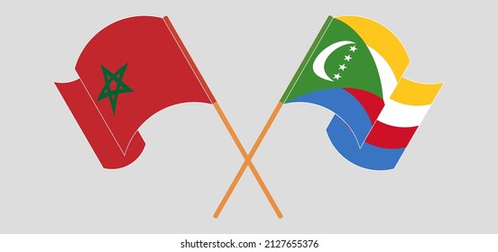 Crossed and waving flags of Morocco and Comoros. Vector illustration
