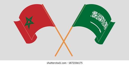 Crossed and waving flags of Morocco and the Kingdom of Saudi Arabia