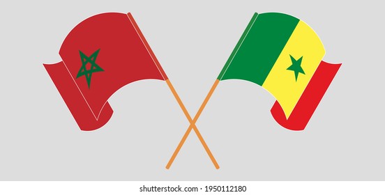 Crossed and waving flags of Morocco and Senegal