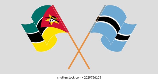 Banderas cruzadas y ondeando banderas de Mozambique y Botswana