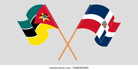 Crossed and waving flags of Mozambique and Dominican Republic. Vector illustration
