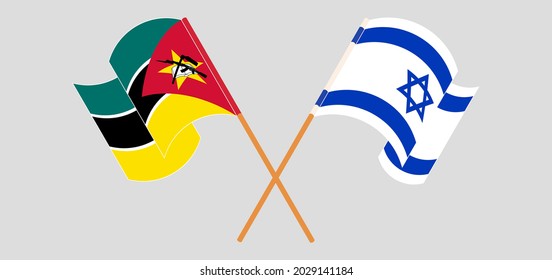 Crossed and waving flags of Mozambique and Israel