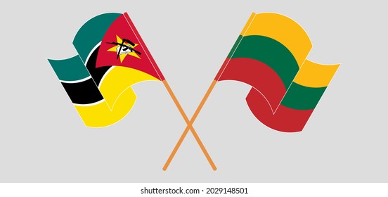Crossed and waving flags of Mozambique and Lithuania