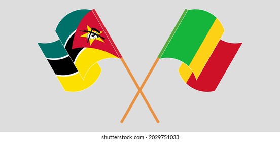 Crossed and waving flags of Mozambique and Mali