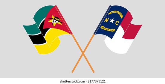 Crossed and waving flags of Mozambique and The State of North Carolina. Vector illustration
