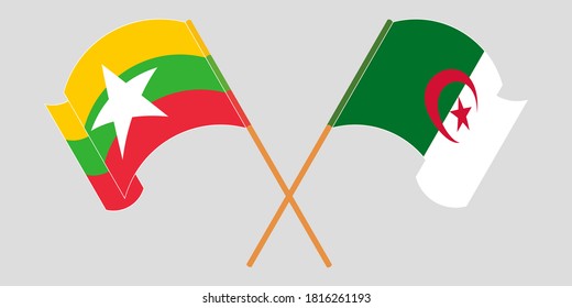 Crossed and waving flags of Myanmar and Algeria