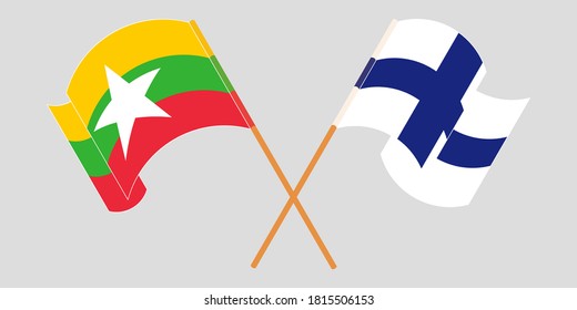 Crossed and waving flags of Myanmar and Finland