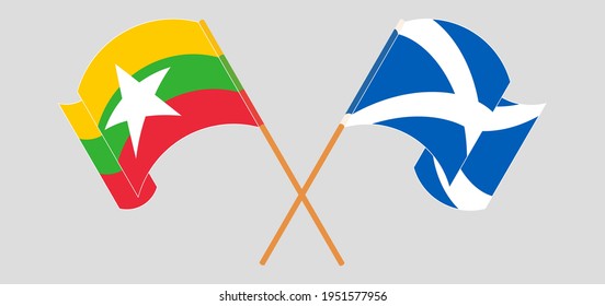 Crossed and waving flags of Myanmar and Scotland