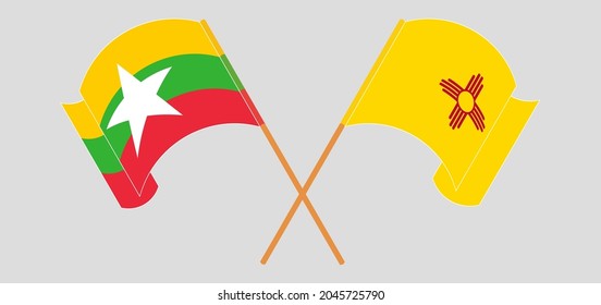 Banderas cruzadas y ondeando banderas de Myanmar y del Estado de Nuevo México