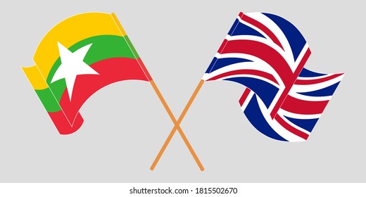 Crossed and waving flags of Myanmar and the UK