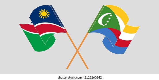 Crossed and waving flags of Namibia and Comoros. Vector illustration
