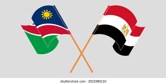 Crossed and waving flags of Namibia and Egypt