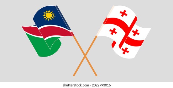 Gekreuzte und wehende Flaggen Namibias und Georgiens