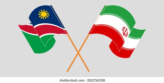 Crossed and waving flags of Namibia and Iran