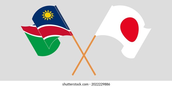 Crossed and waving flags of Namibia and Japan