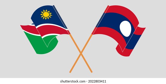 Crossed and waving flags of Namibia and Laos