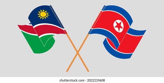 Banderas cruzadas y ondeando banderas de Namibia y Corea del Norte