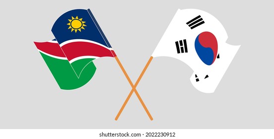 Crossed and waving flags of Namibia and South Korea