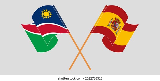 Crossed and waving flags of Namibia and Spain