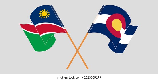 Banderas cruzadas y ondeando banderas de Namibia y del Estado de Colorado