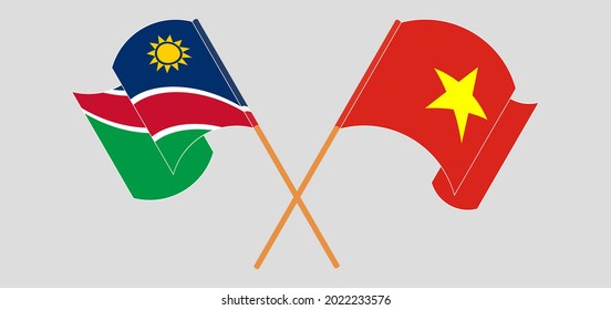 Banderas cruzadas y ondeando banderas de Namibia y Vietnam