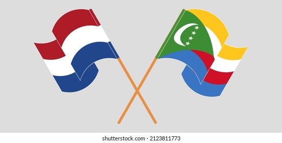 Crossed and waving flags of the Netherlands and Comoros. Vector illustration
