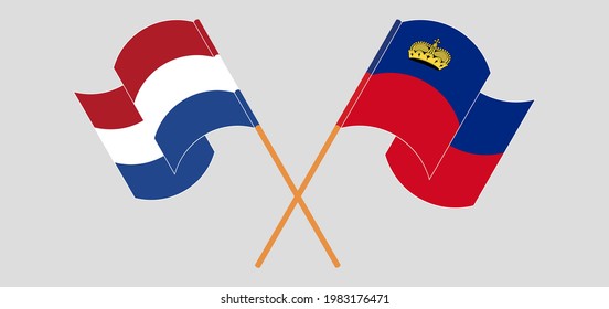Crossed and waving flags of the Netherlands and Liechtenstein