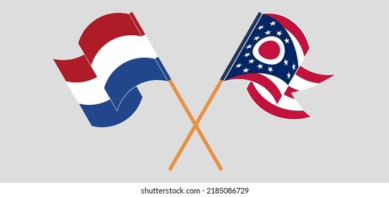 Crossed and waving flags of the Netherlands and the State of Ohio. Vector illustration
