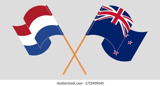 Crossed and waving flags of New Zealand and the Netherlands