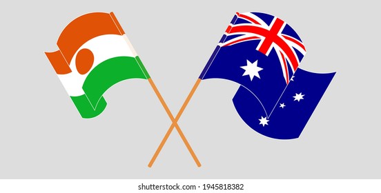 Crossed and waving flags of Niger and Australia