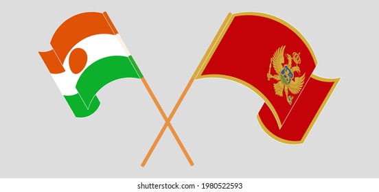 Crossed and waving flags of Niger and Montenegro