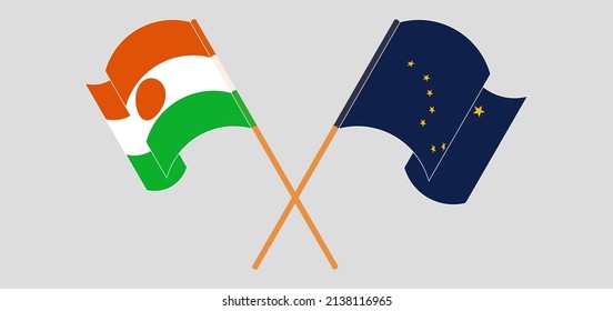 Crossed and waving flags of Niger and the State of Alaska. Vector illustration
