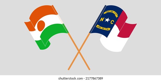 Crossed and waving flags of Niger and The State of North Carolina. Vector illustration
