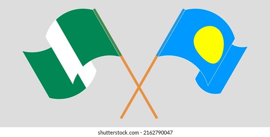 Crossed and waving flags of Nigeria and Palau. Vector illustration
