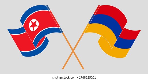 Crossed and waving flags of North Korea and Armenia