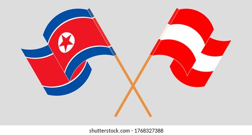 Crossed and waving flags of North Korea and Austria