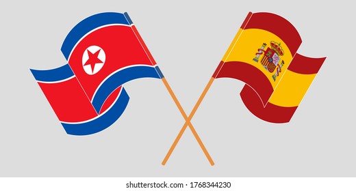 Crossed and waving flags of North Korea and Spain