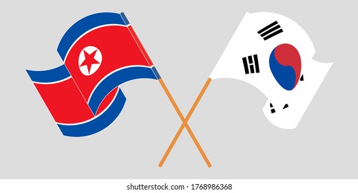 Crossed and waving flags of North Korea and South Korea