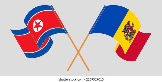 Crossed and waving flags of North Korea and Moldova. Vector illustration
