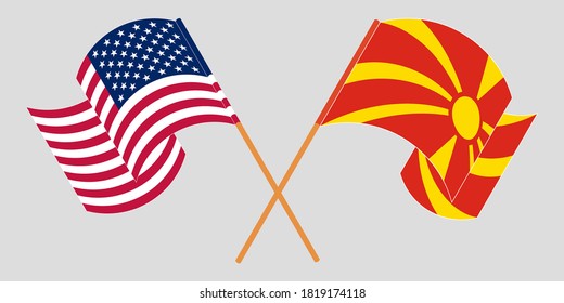 Crossed and waving flags of North Macedonia and the USA