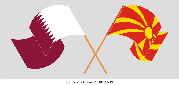 Crossed and waving flags of North Macedonia and Qatar
