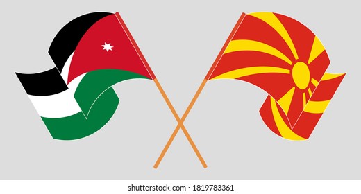Gekreuzte und wehende Flaggen von Nordmakedonien und Jordanien