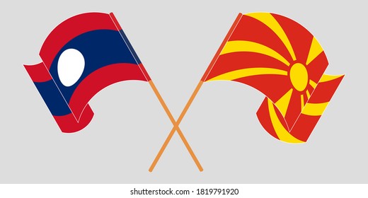 Crossed and waving flags of North Macedonia and Laos