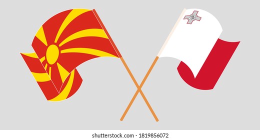 Crossed and waving flags of North Macedonia and Malta