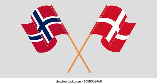 Crossed and waving flags of Norway and Denmark