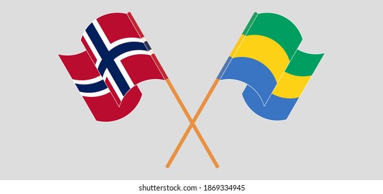 Crossed and waving flags of Norway and Gabon