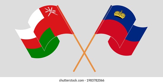 Crossed and waving flags of Oman and Liechtenstein