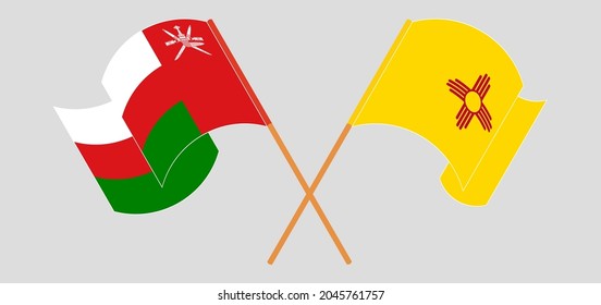 Crossed and waving flags of Oman and the State of New Mexico